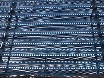 Blue color windbreak panes fixed into a windbreak wall